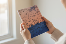 Load image into Gallery viewer, Person holding Wild Words — Chaos Theory Journal closed
